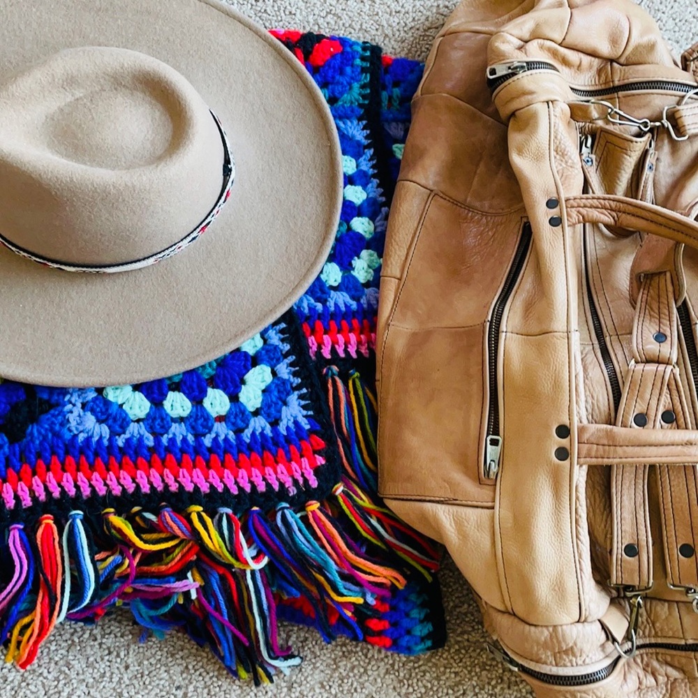 Vintage Tan Leather Travel Bag with Multicolor Crochet Blanket